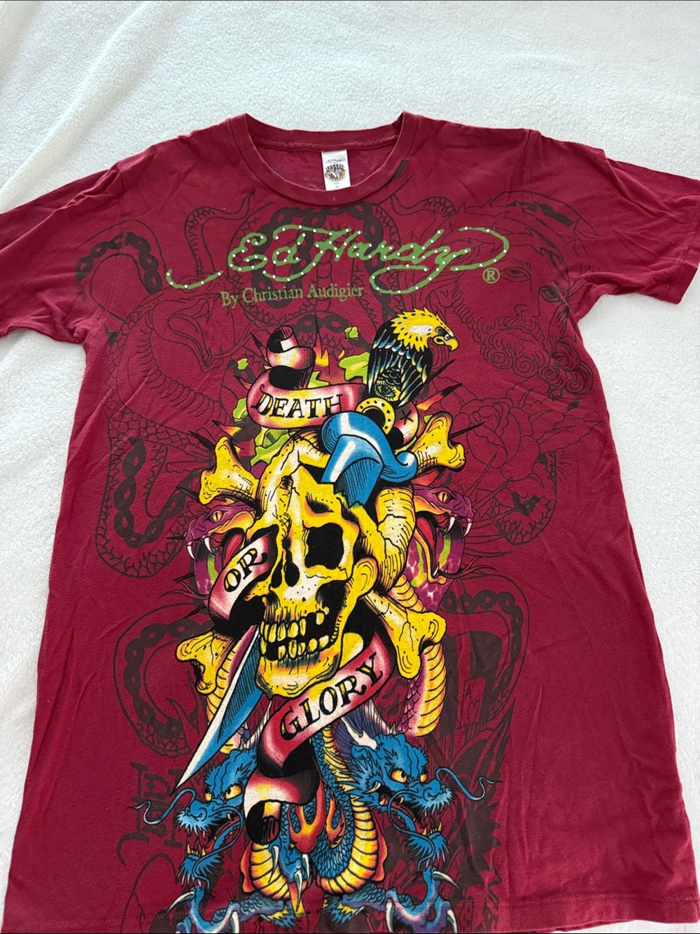 Christian Audigier Men’s Burgundy Graphic Skull Tee with Yellow & Blue Accents